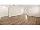 Spacious bedroom features new floors, base molding, and neutral paint at 7554 Violet Vista Ave # 201, Las Vegas, NV 89130