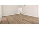 This spacious living room is filled with natural light and features beautiful new flooring at 7554 Violet Vista Ave # 201, Las Vegas, NV 89130
