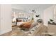 Cozy main bedroom featuring a comfortable bed with stylish bedding, side tables, and tasteful decor at 7554 Violet Vista Ave # 201, Las Vegas, NV 89130