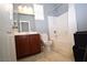 Cozy bathroom featuring tile floors, a tub shower, and a vanity at 8084 Bosco Bay Ave, Las Vegas, NV 89113
