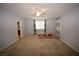 Spacious bedroom with carpet, large window and ceiling fan at 8084 Bosco Bay Ave, Las Vegas, NV 89113