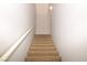 Carpeted staircase leads to the upper level of this inviting home at 8084 Bosco Bay Ave, Las Vegas, NV 89113