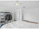 Spacious bedroom features light walls, wood floors, closet storage and natural light from large windows at 8600 W Charleston Blvd # 2098, Las Vegas, NV 89117