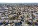 Extensive aerial view of neighborhood, showcasing residential streets and lush greenery at 9225 Evergreen Canyon Dr, Las Vegas, NV 89134