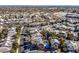 Expansive aerial view showcasing neighborhood homes, nearby roads, and community layout at 9225 Evergreen Canyon Dr, Las Vegas, NV 89134