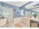 Bright bathroom with double sinks, shower, soaking tub and natural light at 9225 Evergreen Canyon Dr, Las Vegas, NV 89134