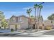 Beautiful two-story home with manicured landscaping, a three-car garage, and a welcoming entryway at 9225 Evergreen Canyon Dr, Las Vegas, NV 89134