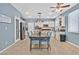 A well-lit kitchen with stainless steel appliances, white cabinets and a marble countertop at 9225 Evergreen Canyon Dr, Las Vegas, NV 89134