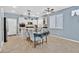 Eat in kitchen featuring white cabinets, stainless steel appliances, granite countertops and a pantry at 9225 Evergreen Canyon Dr, Las Vegas, NV 89134