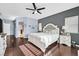 Spacious main bedroom with hardwood floors, ensuite access and natural light at 9225 Evergreen Canyon Dr, Las Vegas, NV 89134