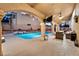 Covered patio area with a full view of the backyard pool at 9225 Evergreen Canyon Dr, Las Vegas, NV 89134