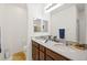 Bright bathroom features double sinks, quartz countertops, and ample storage space at 984 Brilliant Meadow Ave, North Las Vegas, NV 89086