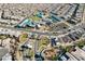 Expansive aerial view of the community featuring manicured landscaping, swimming pools, and tennis courts at 10001 Regency Square Ave, Las Vegas, NV 89148