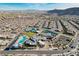 Breathtaking aerial view of the community showcasing pools, tennis courts, and beautiful surroundings at 10001 Regency Square Ave, Las Vegas, NV 89148