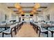 Large dining area with multiple tables, perfect for hosting large gatherings at 10001 Regency Square Ave, Las Vegas, NV 89148