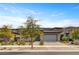 Contemporary home with well-manicured landscaping at 10001 Regency Square Ave, Las Vegas, NV 89148
