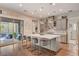 Modern kitchen with gray cabinets, white countertops, large island and stainless steel appliances at 10001 Regency Square Ave, Las Vegas, NV 89148