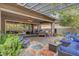 Spacious backyard patio with ample seating and dining space, perfect for outdoor gatherings at 10001 Regency Square Ave, Las Vegas, NV 89148