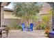 View of the lovely, private, paver-stone patio with mature landscaping at 10001 Regency Square Ave, Las Vegas, NV 89148