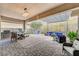 Spacious outdoor patio with built-in grill and ample seating at 10001 Regency Square Ave, Las Vegas, NV 89148