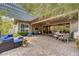 Expansive patio with lounge, dining, and grilling areas at 10001 Regency Square Ave, Las Vegas, NV 89148