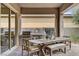 Cozy patio with outdoor kitchen and dining space at 10001 Regency Square Ave, Las Vegas, NV 89148