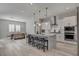 Eat-in kitchen featuring an island with bar seating and stainless steel appliances and ample storage at 10197 Copper Meadow Ave, Las Vegas, NV 89166