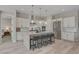 Modern kitchen with an island, stainless steel appliances, and bright white cabinetry at 10197 Copper Meadow Ave, Las Vegas, NV 89166