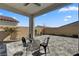 Covered patio featuring outdoor furniture and brick pavers at 10197 Copper Meadow Ave, Las Vegas, NV 89166