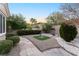 Picturesque backyard featuring mature landscaping and custom hardscape, perfect for outdoor entertaining at 10508 Snyder Ave, Las Vegas, NV 89134