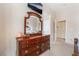 Bedroom view showcasing a dresser and mirror, offering ample storage and style at 10508 Snyder Ave, Las Vegas, NV 89134