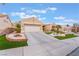 Charming single-story home boasts a well-maintained yard, mature landscaping and attached two-car garage at 10508 Snyder Ave, Las Vegas, NV 89134