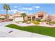 Attractive single-story home with a well-maintained lawn, desert landscaping, and a two-car garage at 10508 Snyder Ave, Las Vegas, NV 89134