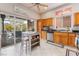 Kitchen with stainless steel appliances, light wood cabinets, and lots of natural light at 10508 Snyder Ave, Las Vegas, NV 89134