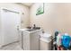 Laundry room with full size washer and dryer at 10508 Snyder Ave, Las Vegas, NV 89134