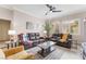 Bright living room with a ceiling fan, neutral paint, and windows for tons of natural light at 10508 Snyder Ave, Las Vegas, NV 89134
