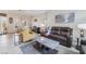 Comfortable living room with tile flooring, neutral paint, and access to the dining room at 10508 Snyder Ave, Las Vegas, NV 89134