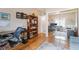 Office area with a sofa, desk and shelving along the wall at 10508 Snyder Ave, Las Vegas, NV 89134