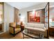 Comfortable living room featuring a sofa, chair, and artwork at 135 E Harmon Ave # 1919, Las Vegas, NV 89109