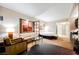 Cozy living space with a bed, sofa, and kitchenette at 135 E Harmon Ave # 1919, Las Vegas, NV 89109