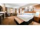 Comfortable primary suite with king bed, desk and seating area at 135 E Harmon Ave # 1919, Las Vegas, NV 89109