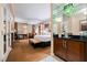 Comfortable hotel bedroom with plush carpet, sitting area and wet bar at 145 E Harmon Ave # 2503, Las Vegas, NV 89109