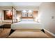 King size bed, seating area, art, and lighting in the hotel suite at 145 E Harmon Ave # 2503, Las Vegas, NV 89109