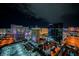 Night view of the colorful Las Vegas skyline with brightly lit buildings against a dark sky at 145 E Harmon Ave # 2503, Las Vegas, NV 89109