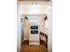 Neat closet space with an ironing board, safe, and shelves for organization at 145 E Harmon Ave # 2503, Las Vegas, NV 89109