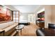 Open suite featuring a kitchenette, living area, and bedroom with natural light and stylish decor at 145 E Harmon Ave # 2503, Las Vegas, NV 89109