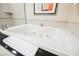 A bathroom featuring a bathtub, with shower featuring modern fixtures and finishes at 145 E Harmon Ave # 819, Las Vegas, NV 89109