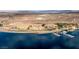 Beautiful lakefront condos with a private marina, resort pool, and stunning mountain views at 15 Via Mantova # 303, Henderson, NV 89011