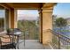 Balcony with wrought iron railings and seating with mountain views at 15 Via Mantova # 303, Henderson, NV 89011