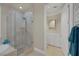 Bathroom with soaking tub, glass enclosed shower, and private toilet room at 15 Via Mantova # 303, Henderson, NV 89011